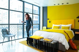 25 Bold Ways to Decorate with Yellow - Photo 5 of 25 - Neutral accents offset bright yellow details in this room.