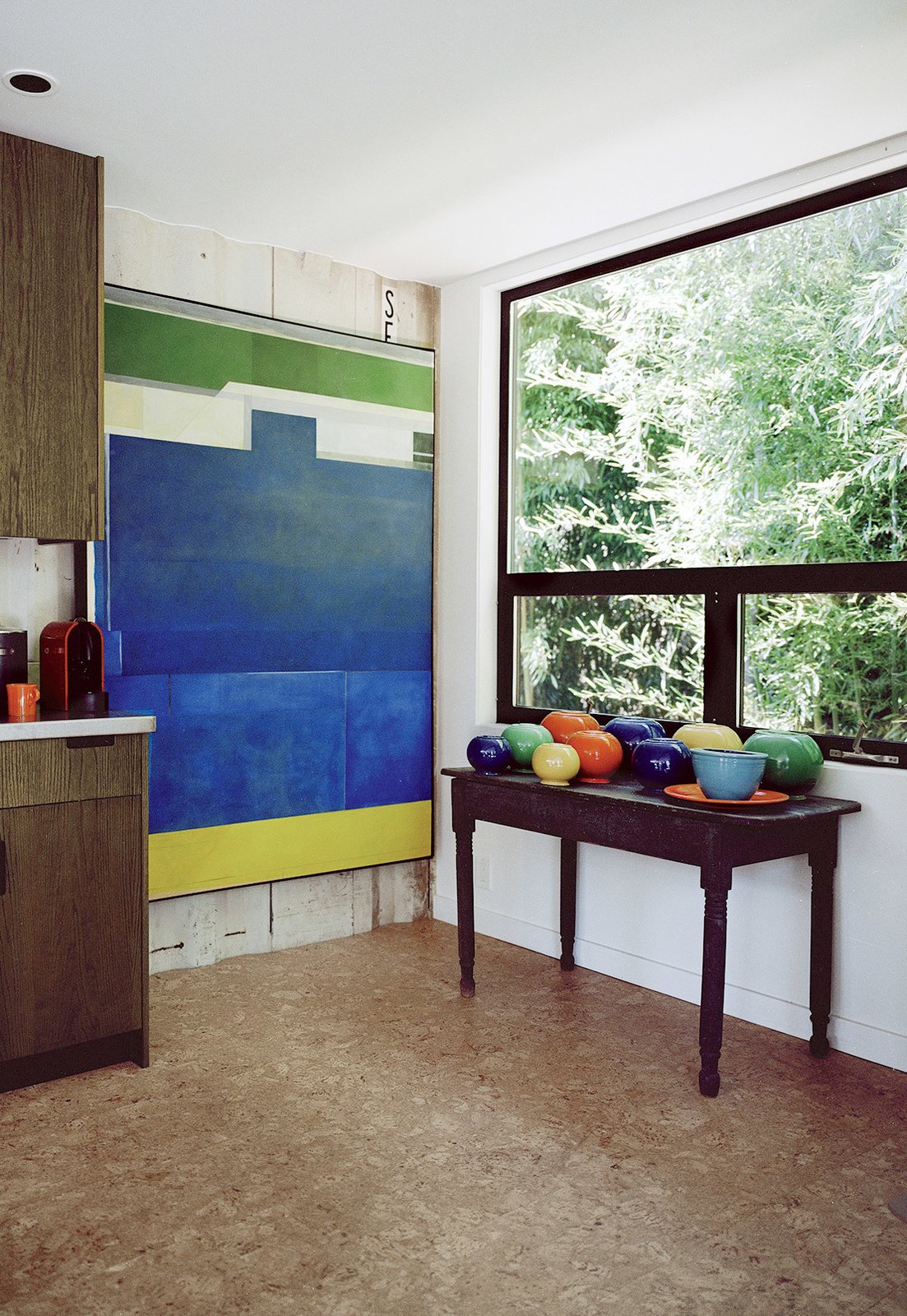 The couple opted for a floating floor of cork tiles from Ecore Commerical Flooring. In this method of installation, tiles are affixed to one another, rather than nailed into the floorboards. This allows the tiles to expand and contract with heat, making it ideal for radiant surfaces. Moseley and Mathesius are also fans of cork’s natural color. ecorecommercialflooring.com
