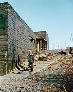 A series of charred modern boxes, the home Petra Sattler-Smith and Klaus Mayer designed for Martin Buser and Kathy Chapoton, is organized around views of the Alaskan landscape.
