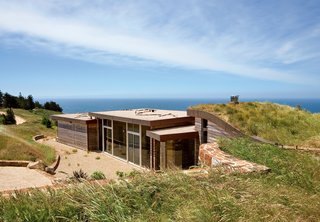 11 Hillside Homes That Feature a Balancing Act With Nature - Photo 2 of 10 - "I’ve been all around the world, and whenever I come back here, I realize that the Pacific Ocean seen from those cliffs is the most beautiful view on earth," says the resident of this house built into a hillside in Big Sur, California.