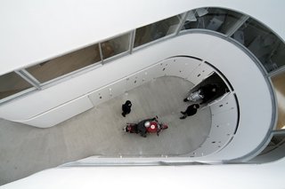 View more photos of this Tokyo apartment designed around motorcycles at wearedesignbureau.com. Photo by Hiroyasu Sakaguchi.