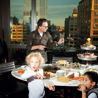 A tulip table is the perfect height for snacking on kid appropriate apple slices and crackers in architect Cass Calder Smith’s New York high-rise. Photo by Brian Finke.