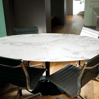 Calder Smith uses his elliptical table, designed in 1956 by Eero Saarinen for Knoll, as a place for both dining and working. "It’s not as heavy as you might think, so it’s easy to move around," says the architect. "Plus the base allows room for lots of legs—we’ve had up to eight people sitting around it at one time."