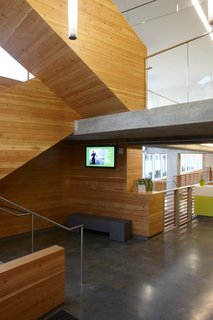 Commons' Grounds - Photo 1 of 9 - Investing in the look and feel of the space was important to the organizations involved with the project. Here, a wealth of materials in the interior. Photo by Chris Mueller.
