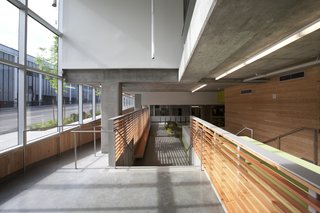 Commons' Grounds - Photo 3 of 9 - Ground level floor-to-ceiling windows extend the length of the west façade. Photo by Sally Schoolmaster.