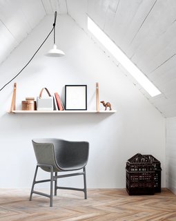 11 Examples of How to Incorporate Traditional Building Materials Into Your Modern Home - Photo 12 of 12 - Crisp white walls contrast with the surface of the painted white boards of the ceiling, keeping the interiors modern and clean.