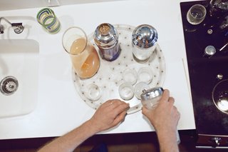 Stacey and Doug get down to business making drinks.