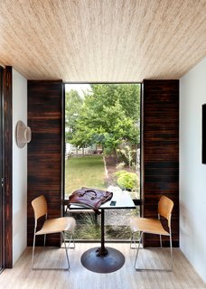 Even in a small space—this unit is one of the company’s smallest—there’s plenty of room for a sitting area. In addition to montoread and charred wood, this space has American Clay walls, a soft plaster-like coat that when punctured or cracked, a spritz of water will allow minor flaws to be smoothed clean.