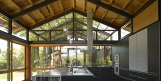 Preview "The Modern Family" Video - Photo 3 of 4 - The house has a variety of indoor and outdoor spaces where the family can hang out, including a soaring kitchen and, through a big glass-walled door, an outdoor dining pavilion shaded by a vine-covered arbor.