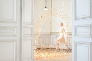 'Moving Meshes' at Domaine de Boisbuchet - Photo 1 of 8 - The sunlit interiors of Domaine de Boisbuchet come to life with Dutch designer Maria Blaisse's bamboo structures in the Moving Meshes exhibition. Part organic sculpture, part costume design, these lattice-like forms suggest new possibilities for textile applications in architecture and design.