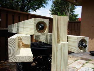"I used two 4"x4"x8' pressure-treated fence posts to make the legs more durable against the weather. To ensure they were strong enough to support the weight of the granite, I made the cuts so that the corner of the box could fit inside and rest on top of the leg. The cut where the bottom of the grill body sits has a notched cut so that it will lock with it. I installed wheels on each leg to make moving easier. I wanted to convey a clean look, so I recessed the wheels to hide them from view. This way, the grill will look like it floats above ground, and will be protected from water puddles."