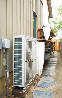Pallas Altherma<br><br>Smart siting and passive design laid the groundwork, but to approach the couple’s goal of making a zero-energy house, Arkin Tilt selected an Altherma air-to-water heat pump system by Daikin. "The technology has been around for decades in Europe," Tilt says, "but this is one of the first installed in California." The device draws heat from the air outside and uses it to warm water both for domestic use and to power the in-floor radiant heating on the ground floor and in the upstairs bathroom. Best of all, the electricity the system uses is offset by 24 photovoltaic panels by Sanyo on the roof.<br><br>daikinac.com<br><br>us.sanyo.com/solar