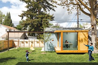 Work It<br><br>"We wanted to open up the back of the house, but there’s nothing to look at," says Dana. "So we decided to put something in our yard as a focal point, to create our own view." The architects came up with a glass-walled studio, which Dana uses as her home office. The architects mounted a steel I-beam that spans the yard, with holes drilled at eight-inch intervals for maximum flexibility of use. Right now it’s used for Ikea play equipment, but later they plan to hang a hammock and a movie screen.<br><br>ikea.com