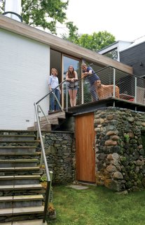 The original stone wall was the home’s architectural polestar.