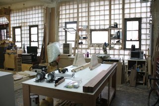 Stephanie Beamer does most of the woodworking in their shop just a few floors up from the studio.