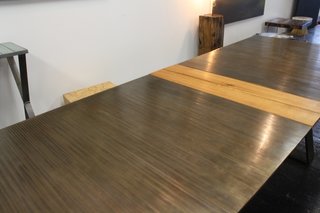Velloso works primarily in steel and wood. A table like this is made of 246 steel bars welded together and takes him about three weeks to complete.