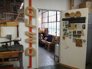 DMFD's office is set off of a shared working space. DMFV focuses on environmentally sustainable furniture and object design. Designer Daniel Michalik's favored medium is cork, which he sources from sustainably managed forests.