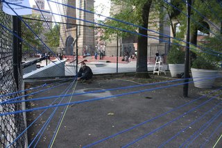 The Space Beside the Skate Park - Photo 3 of 4 - Volunteers install the pop-up exhibition. Architecture for Humanity hopes to find a permanent solution to the underutilized space.
