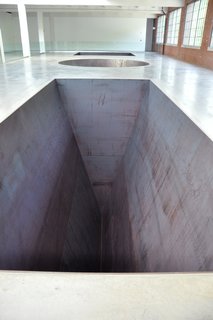 Weekend Detour: Beacon, New York - Photo 6 of 27 - North, East, South, West, Michael Heizer, 1967/2002. Dia Art Foundation.<br><br>In addition to rotating exhibits, Dia also has several works on permanent view. This includes the above piece by Michael Helzer, which gives visitors the feeling of an endless drop when viewed from the right angle. Though roped off for safety reasons, those lucky enough to be allowed past can experience a jarring optical illusion that displaces the senses, while also creating a sense of aesthetic wonder.