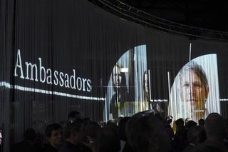 Dutch Design Week 2012, Pt. 1 - Photo 2 of 24 - The event was held in the main hall, set within this impressive circular curtained space that provides a 360-degree projected screen backdrop that changed throughout the night. Partners Kiki van Eijk and Joost van Bleiswijk, and Robert Bronwasser present their vision for the event to the audience.