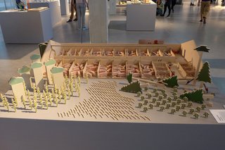 Dutch Design Week 2012, Pt. 1 - Photo 11 of 24 - Tom Verthuis's "Playing Food" is a provocative take on the traditional wooden animal toys children to play with; the piece depicts the reality of farming practices and shows how meat is produced.