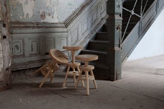 Anna Karlin: Designing in 360 Degrees - Photo 4 of 6 - Inlaid brass details pop on these solid ash stools. With a hand-tooled screw spindle, the option of adjusting the height allow these to work at a desk or as a nightstand. Photo by Don Freeman.