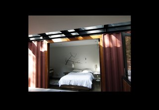 "We relied on different-sized windows and a varied the placement of the windows. Rather than place a big glass wall, we used the windows to craft views of the property. If you want to see outside go outside, but inside, the framed views let you see everything differently," explains Fenster.
