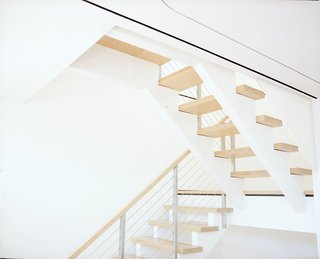 What Would Eichler Do? - Photo 4 of 8 - Two-inch-thick bamboo treads and a bamboo handrail on the stairs lead the way to the second floor.