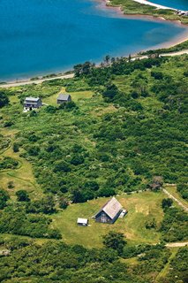 Jens Risom's Block Island Family Retreat - Photo 5 of 13 - The Risom plot, located on the northern portion of the island, is bordered by a low stone wall, an aesthetic element that appears throughout Block Island.