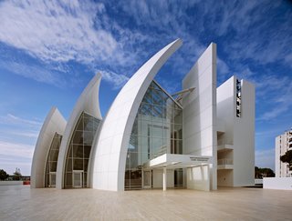 Richard Meier's Practice at 50 - Photo 6 of 10 - The Jubilee Church in Tor Tre Teste, Italy, 1996-2003. (Copyright Scott Frances)<br><br>"White is the most wonderful color because within it you can see all the colors of the rainbow. The whiteness of white is never just white; it is almost always transformed by light and that which is changing; the sky, the clouds, the sun and the moon."