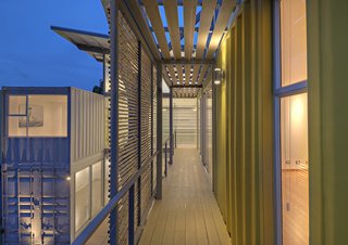 Who Knew a Relaxing Tropical Retreat Could Be Made of Shipping Containers? - Photo 2 of 10 - Trejos found that working with the containers was like playing with puzzle pieces. By arranging them in stacks of two and sliding the top containers, she created an interior courtyard and gallery space as well as terraces on the upper level. "Working with containers for the first time was a big challenge," she says, "but from the first draft on, it was an awesome experience. They already create space, so you just need to play with the puzzle pieces."