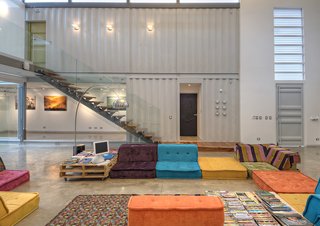 Who Knew a Relaxing Tropical Retreat Could Be Made of Shipping Containers? - Photo 6 of 10 - Trejos incorporated a variety of reused and recycled material into the project, such as shipping pallet tables, beds made from recyclyed plastic, and couches crafted in Costa Rica.