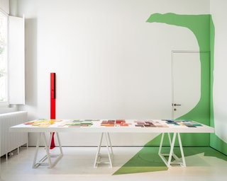 This House Proves Art Galleries Can Be Super-Friendly - Photo 14 of 18 - A workspace within Wenes's Antwerp house and gallery features splashes of color.