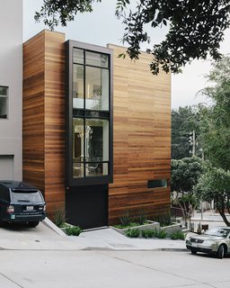 After multiple renovations, this home had become a pseudo-Brutalist pink stucco box. However, its location on a sloping corner possessed both views and parking—two hot commodities in San Francisco real estate. Architect George Bradley seized the opportunity to make something great. "The house was designed to complement the challenging triangular corner site and its context," he explains.