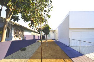 The houses, like the 53rd Street Prototype, feature lean and gracious walkways to the front door. "Though these prototypes are set in economically challenged neighborhoods of South Los Angeles, their design provides for integrated defensible space while maintaining openness and connection to the outdoors," states the project description.