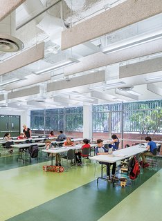 A Forgotten Insurance Building Finds New Life as a Humming High School - Photo 1 of 5 -