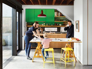 The family selected a Leonardo table by Achille Castiglioni to serve as additional countertop space. Waddell made the cabinets with a friend.