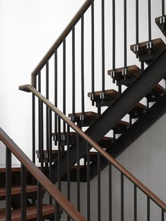 Tedesco's father was a precision machinist and his uncles worked as welders and carpentry framers. As a tribute to his family's history, Tedesco made the blackened-steel-and-wood staircase a focal point—it can be seen from nearly every room in the house.