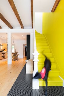 25 Bold Ways to Decorate with Yellow - Photo 9 of 25 - "I always wanted to have my very own yellow brick road," says Viviana de Loera, whose favorite part of the home is the playful staircase. The original stairs and handrail were preserved in the renovation.