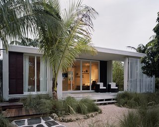 This 685-square-foot prefab shelter by Dutch firm Cubicco was built to withstand Category 5 hurricanes, extreme heat and cold, 10-foot snow loads, and earthquakes. Cubicco’s prefab houses are built with laminated veneer lumber, an engineered material that uses up to 90 percent of a tree—compared to typical wood timbers that use only 60 to 70 percent. Modules can be disassembled if the owners relocate. 