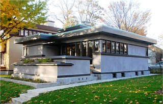 10 Frank Lloyd Wright Buildings We Love - Photo 5 of 10 - The only grouping of Frank Lloyd Wright's early American System-Built Homes—built by Arthur Richards and designed with standardized components for mass appeal to moderate-income families—is situated in the Burnham Park neighborhood in Milwaukee, Wisconsin. The four model 7A duplexes, one model B1 bungalow (shown here), and model C3 bungalow were added to the National Register of Historic Places in 1985.