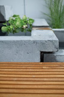 A detail of the interlocking concrete tubs.
