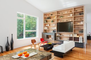 Here's the living room. "It's a really wonderful thing to be able to design a house for your parents," says Yoon. "It was a very personal an intimate process."