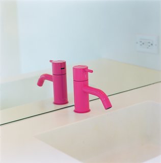 How to Design with Pink - Photo 5 of 15 - Eric Grunbaum added a hot pink powder-coated faucet by Vola for the downstairs bath in his Venice Beach home. Photo by Ye Rin Mok.