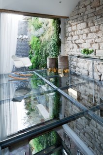 The Parisian flat that American-born architect Michael Herrman shares with his wife, Cécile, and their 2-year-old daughter, Rose, had been nearly untouched since the 1790s, when it was built. "But I wanted to try and reveal some of its age in a fresh new context," Herrman said.