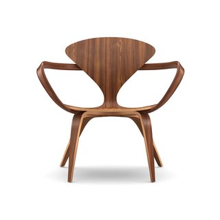 A Cherner Chair Retrospective - Photo 23 of 23 - Connecticut. Benjamin Cherner reproduces the iconic designs of his father, Norman, for the Cherner Chair Company, based in Ridgefield, Connecticut. The furniture, like this lounge arm chair, sports organic shapes made in molded plywood with a natural walnut finish.