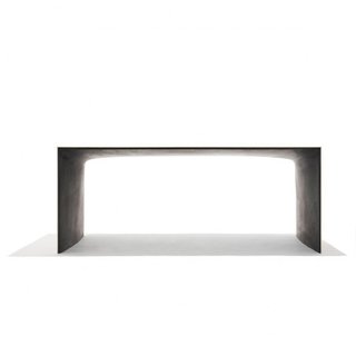 Concrete Gable Table by Christian Flindt-A table that combines fiber concrete and ash wood. Due to the robust nature of the concrete, the ash veneer can be made extra thin without breaking.