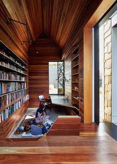 10 Creative Uses of Reclaimed Wood - Photo 2 of 10 - The library is lined in reclaimed spotted gum that Maynard says "brings with it wisdom from its previous life." A stained glass window by Leigh Schellekens makes the contemplative room feel like a domestic chapel.