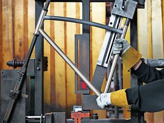 One of Shinola's 60 factory workers assembles a bicycle. Photo by: John Spinks