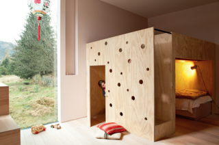 15 Modern and Creative Spaces For Kids - Photo 10 of 15 - The combination bunk bed and playhouse is another whimsical gesture Bergendy Cooke designed specifically for her two daughters. The spaces are organized in such a way that they can play independently or together.